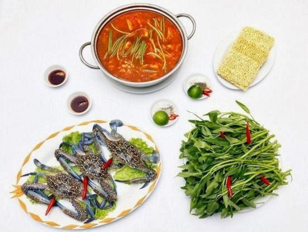 Morning glory hotpot with crab is a coastal favorite in vietnam’s seaside cities
